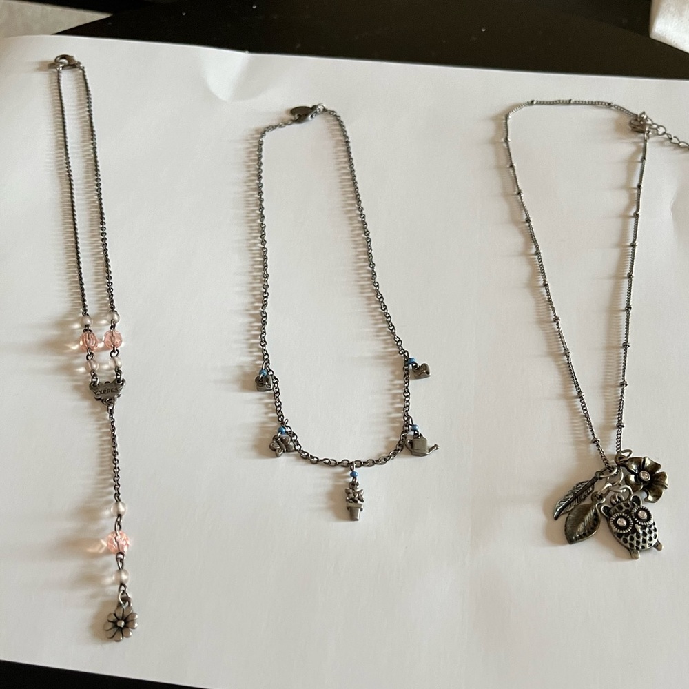 Express necklaces Sold together. I got them when worked there (ages ago) likenew